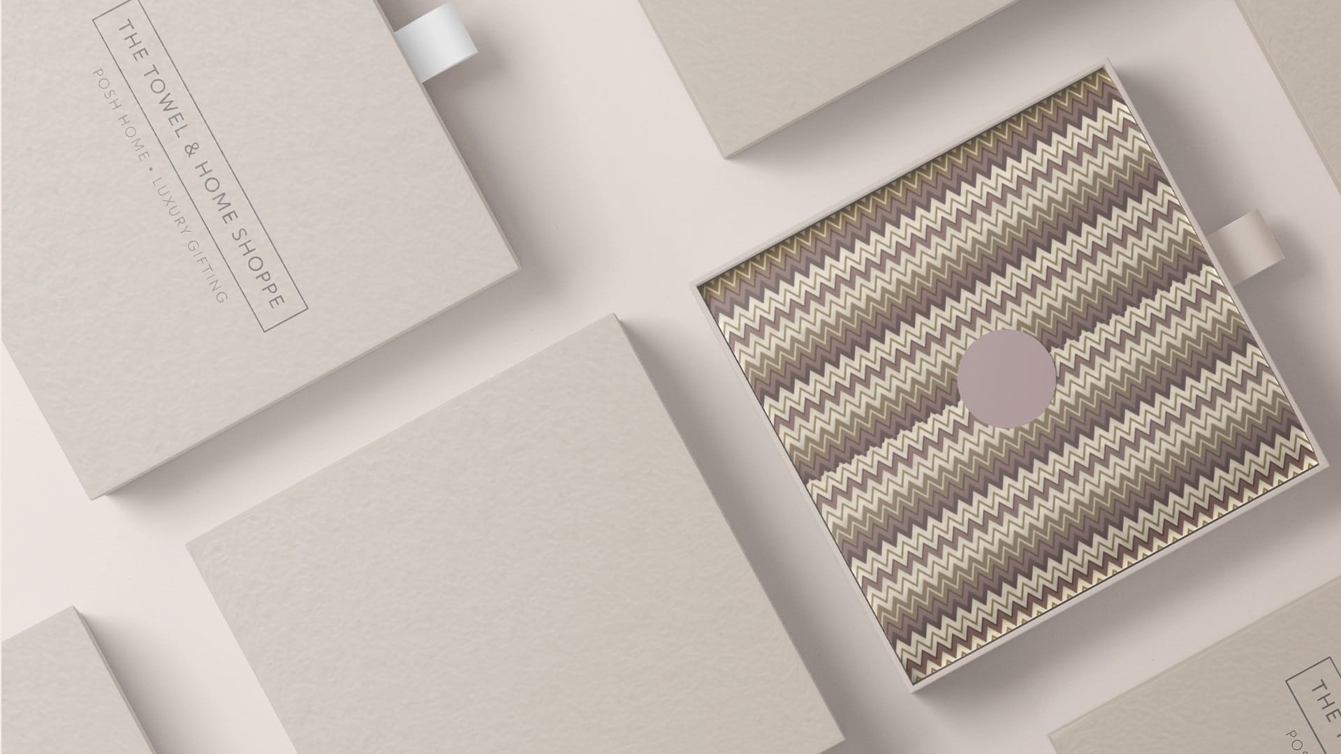boxes with a logo on a beige background